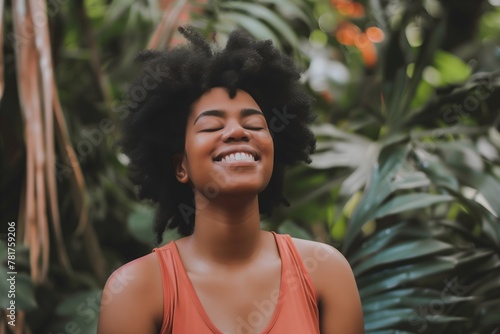 Joyful African American Woman with Afro Hair Embracing Nature, Expressing Happiness and Contentment Outdoors