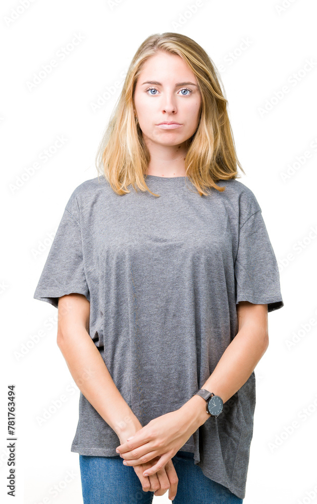 Beautiful young woman wearing oversize casual t-shirt over isolated background Relaxed with serious expression on face. Simple and natural looking at the camera. Beautiful young woman wearing oversize casual t-shirt over isolated background Relaxed with serious expression on face. Simple and natural looking at the camera.