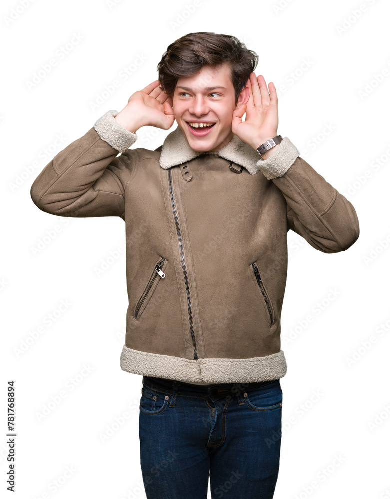 Young handsome man wearing winter coat over isolated background Trying to hear both hands on ear gesture, curious for gossip. Hearing problem, deaf Young handsome man wearing winter coat over isolated background Trying to hear both hands on ear gesture, curious for gossip. Hearing problem, deaf