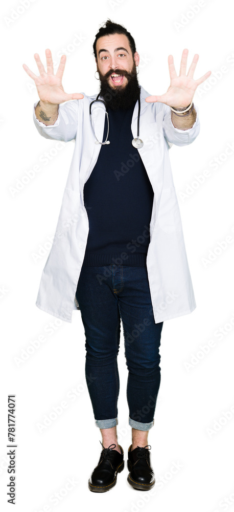 Doctor with long hair wearing medical coat and stethoscope showing and pointing up with fingers number ten while smiling confident and happy. Doctor with long hair wearing medical coat and stethoscope showing and pointing up with fingers number ten while smiling confident and happy.