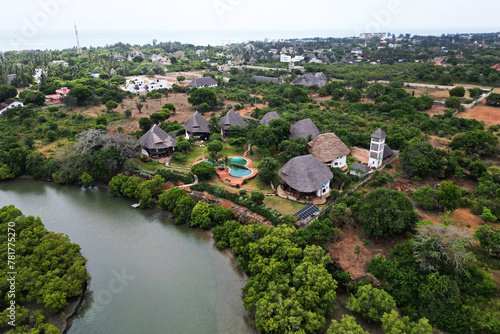 top view of Congo River among the jungle and houses in the forest.