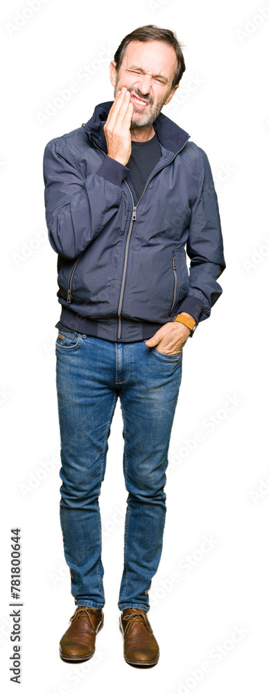Middle age handsome man wearing a jacket touching mouth with hand with painful expression because of toothache or dental illness on teeth. Dentist concept. Middle age handsome man wearing a jacket touching mouth with hand with painful expression because of toothache or dental illness on teeth. Dentist concept.