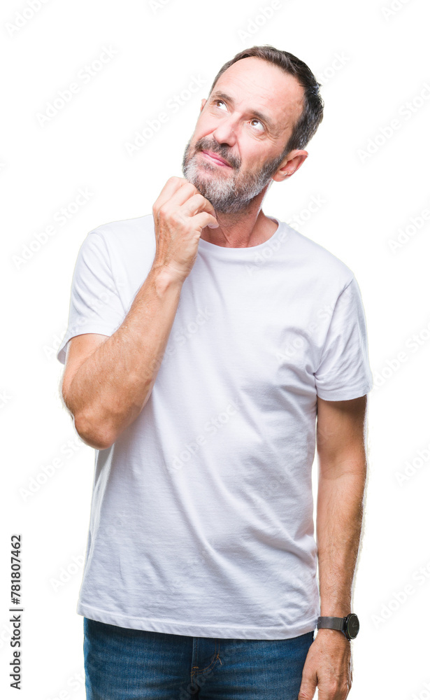 Middle age hoary senior man wearing white t-shirt over isolated background with hand on chin thinking about question, pensive expression. Smiling with thoughtful face. Doubt concept. Middle age hoary senior man wearing white t-shirt over isolated background with hand on chin thinking about question, pensive expression. Smiling with thoughtful face. Doubt concept.