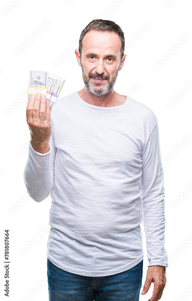 Senior hoary man holding buch of dollars over isolated background with a confident expression on smart face thinking serious Senior hoary man holding buch of dollars over isolated background with a confident expression on smart face thinking serious