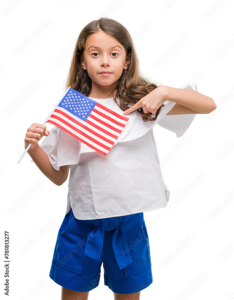 Brunette hispanic girl holding flag of United States of America with surprise face pointing finger to himself Brunette hispanic girl holding flag of United States of America with surprise face pointing finger to himself