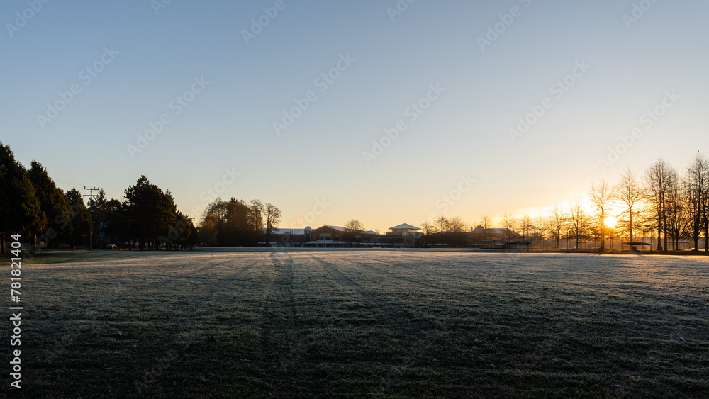 RICHMOND, CANADA - NOVEMBER 24, 2023: Magic autumn morning and morning mist over the field in the park