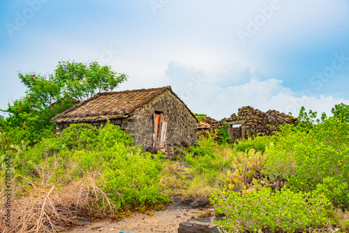 Stone houses and stone piles in the ancient salt fields of Yanding, Danzhou, Hainan, China photo