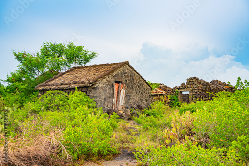 Stone houses and stone piles in the ancient salt fields of Yanding, Danzhou, Hainan, China photo