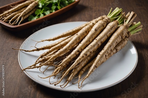 Fresh ginseng root set out on a platter photo