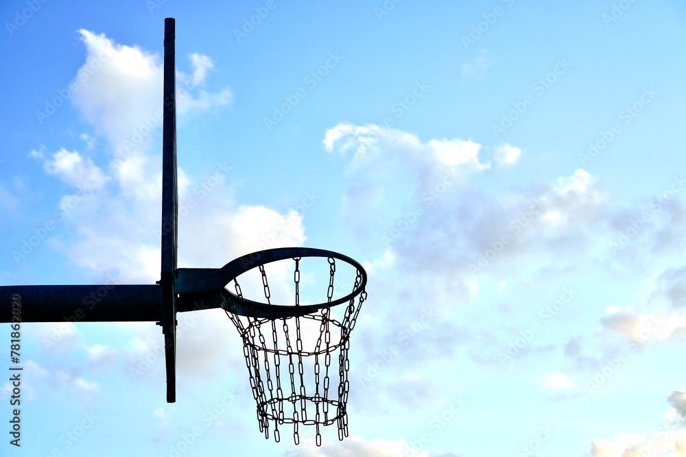 basketball hoop on blue sky background