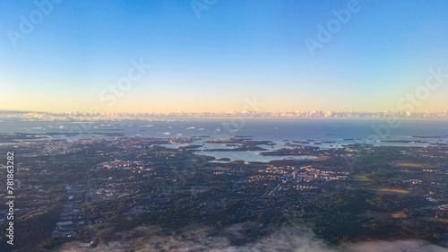 aerial view over Helsinki coastline in Finland in the summer with blue clear sky and the sea
