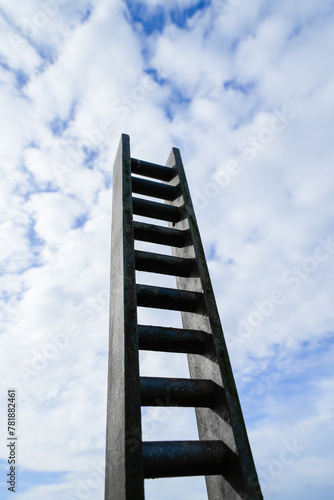 Ladder to heaven. Ladder high up into the sky. 