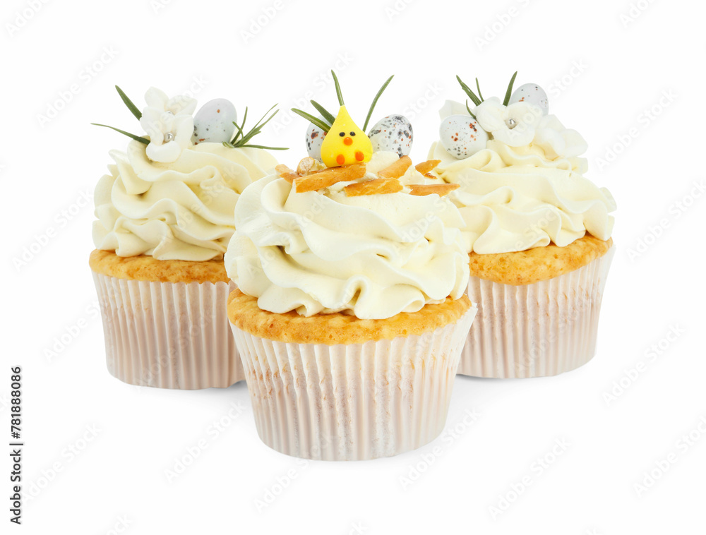 Tasty Easter cupcakes with vanilla cream isolated on white Tasty Easter cupcakes with vanilla cream isolated on white