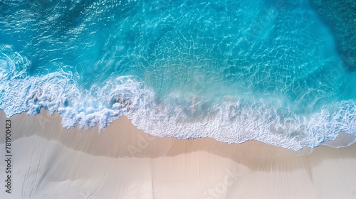 top view of a beautiful sea wave washing the shore with fine clean white sand. the private beach of every tourist's dream for relaxation #781900423