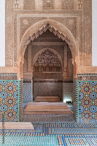 Very ornate, arabic archway, covered in carved wood and mosiac tiles.