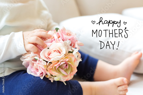 Mother's Day message with toddler boy with flowers on a couch