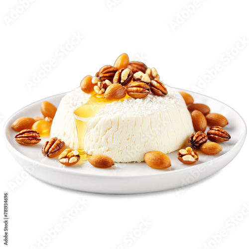 Ricotta cheese fluffy white mound drizzled with honey and sprinkled with toasted pine nuts Culinary © panophotograph