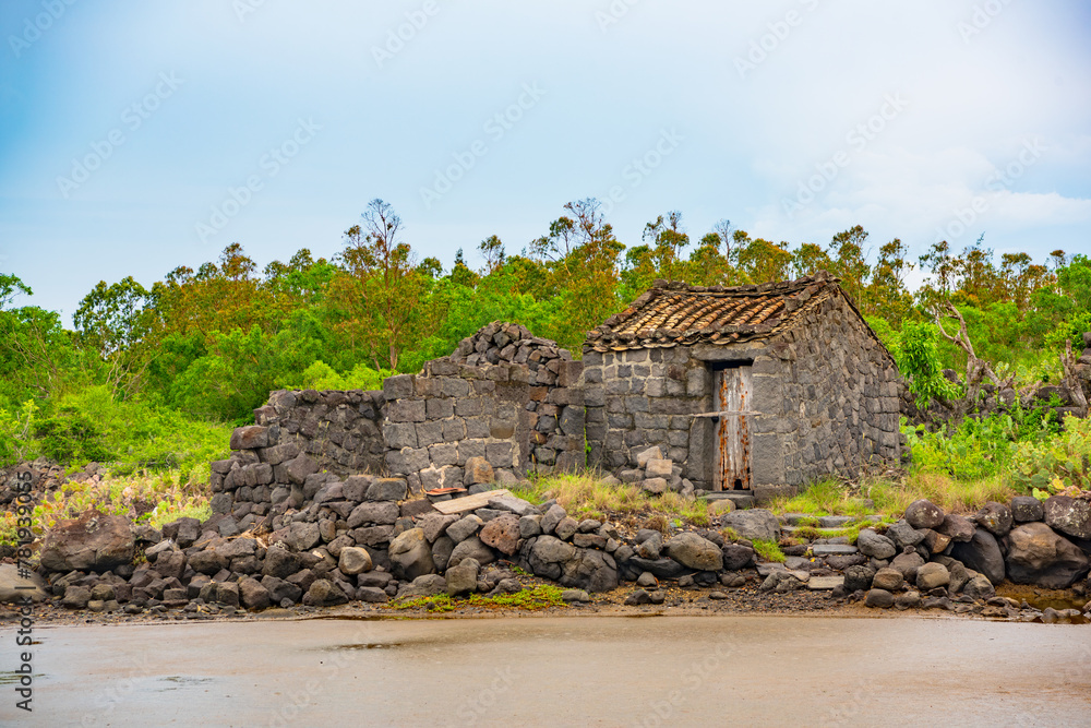 Stone houses and stone piles in the ancient salt fields of Yanding, Danzhou, Hainan, China Stone houses and stone piles in the ancient salt fields of Yanding, Danzhou, Hainan, China