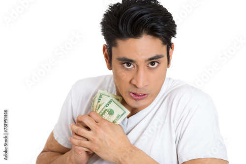 Photos portrait of a greedy young  man, holding dollar banknotes tightly, isolated on white background