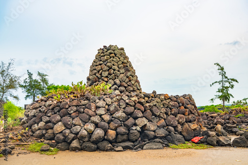 Stone houses and stone piles in the ancient salt fields of Yanding, Danzhou, Hainan, China photo