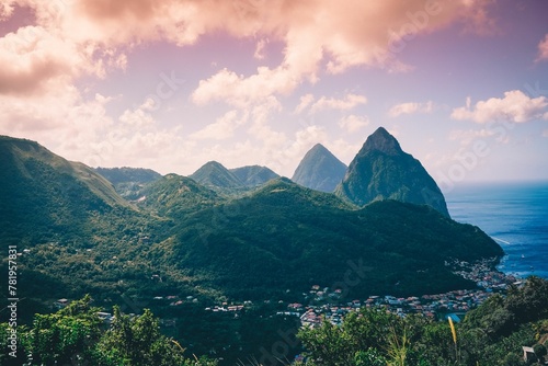 Beautiful landscape of the green forests of St Lucia on the sunset photo