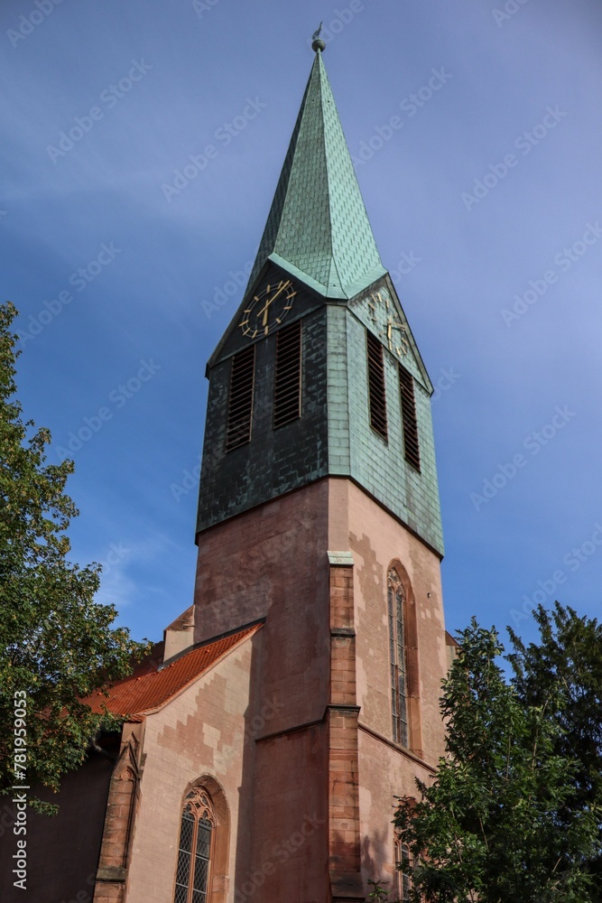 Fototapeta premium Vertical shot of St. Peter's Protestant church under blue sky in Heidelberg, Germany