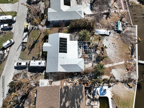 Canvas Print Aerial of the aftermath of the destructive Hurricane Ian in a coastal residentia