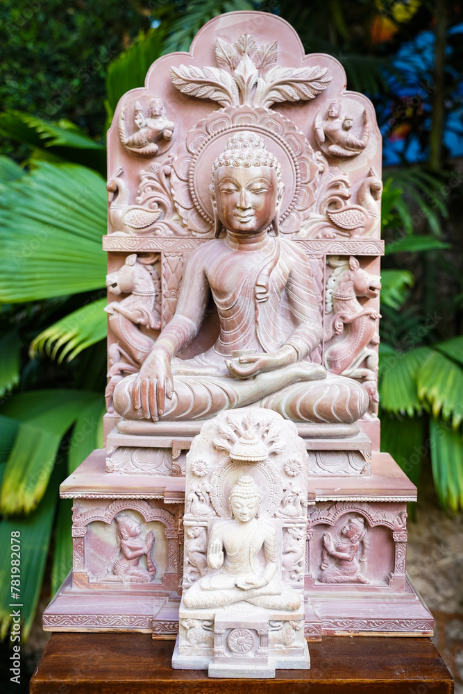 Closeup of a sculpture of an Asian deity