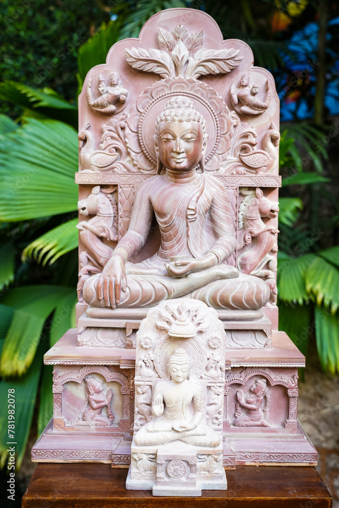Closeup of a sculpture of an Asian deity Closeup of a sculpture of an Asian deity