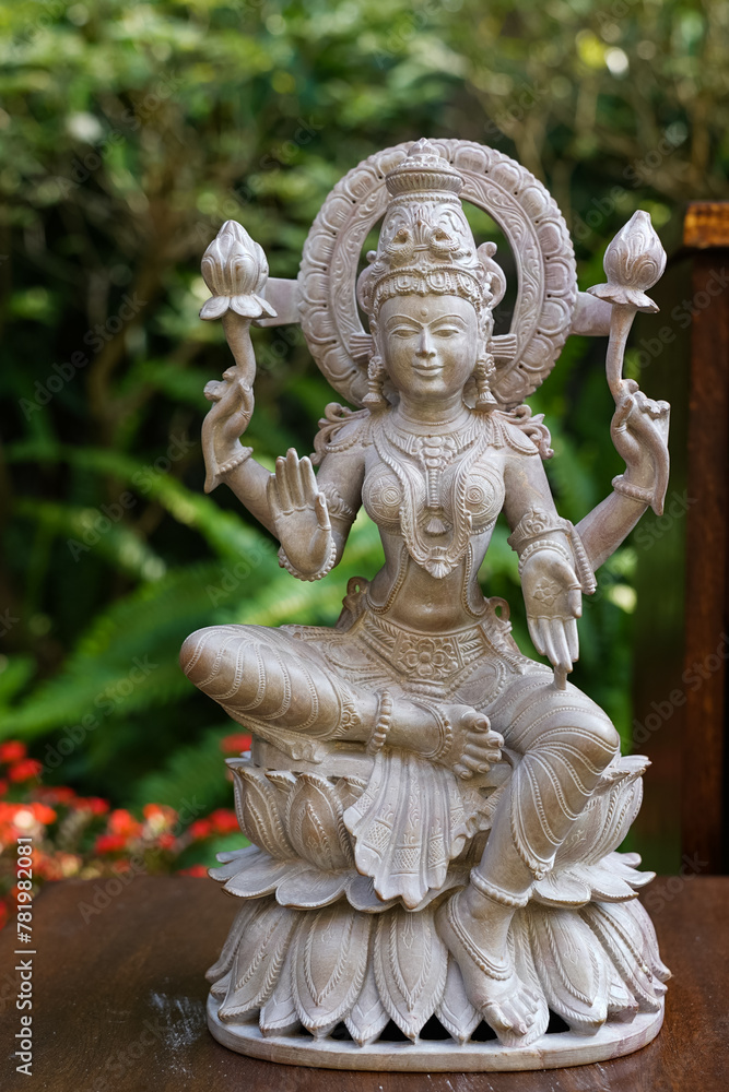 Closeup of a sculpture of an Indian deity Closeup of a sculpture of an Indian deity