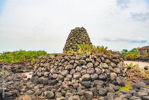 Stone houses and stone piles in the ancient salt fields of Yanding, Danzhou, Hainan, China photo