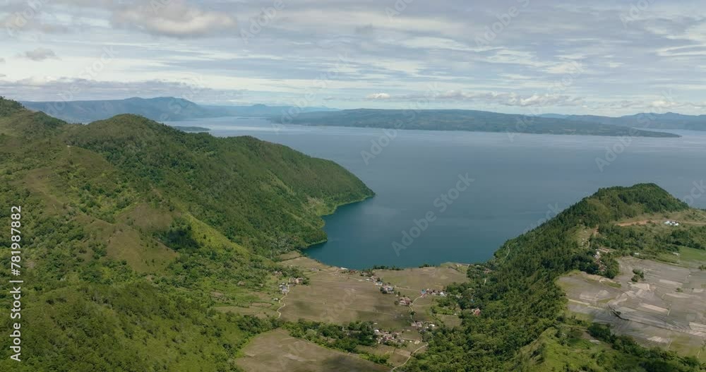 Top view of lake Toba and farmland in the highlands. Sumatra, Indonesia. Top view of lake Toba and farmland in the highlands. Sumatra, Indonesia.