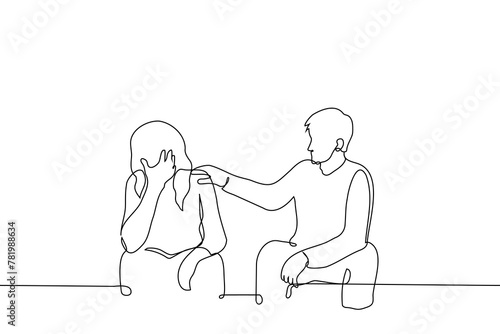 man consoles an upset woman sitting next to her - one line art vector. concept man put hand on the shoulder of women who covered eyes with her hand and sits next to him