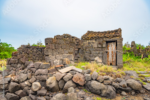 Stone houses and stone piles in the ancient salt fields of Yanding, Danzhou, Hainan, China photo