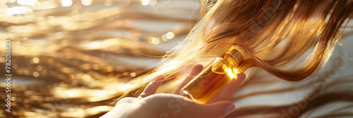 A cascade of silky hair, bathed in sunlight, flows over a hand delicately holding a bottle of nourishing hair oil