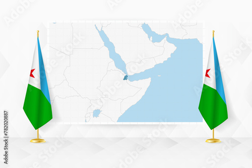 Map of Djibouti and flags of Djibouti on flag stand.