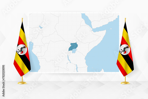 Map of Uganda and flags of Uganda on flag stand.