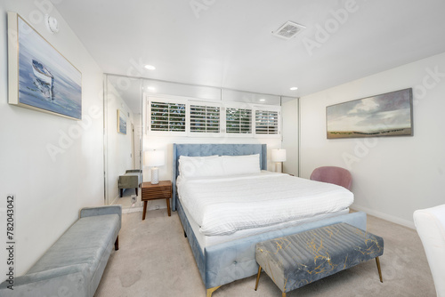 Cozy room with a sofa, bed, and dresser in Hidden Hills, CA © Wirestock