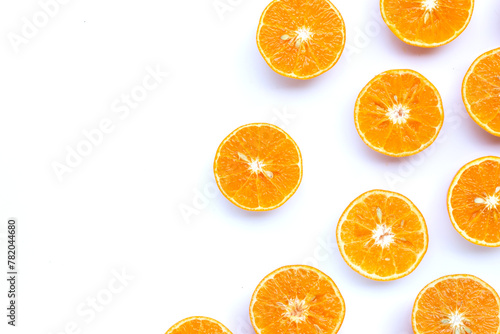 Orange fruits on white background.