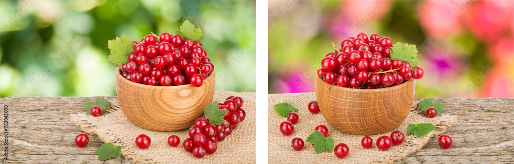 Red currant berries in wooden bowl on wooden table with blurry garden background Red currant berries in wooden bowl on wooden table with blurry garden background