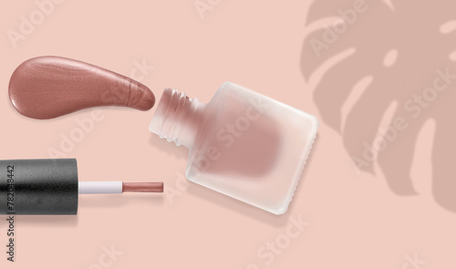 Color nail polish and brush over pink background flat lay