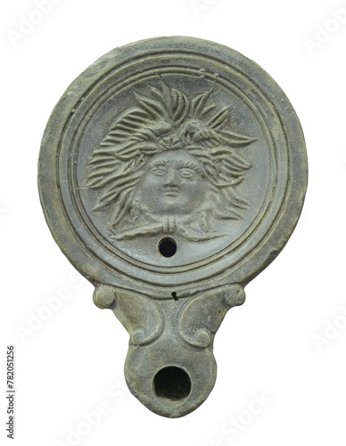 Ancient Roman oil lamp with the head of Medusa Gorgon