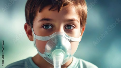 Portrait of child doing inhalation in hospital during allergic asthma attack. Inhaled hormone therapy for treatment of respiratory tract. photo