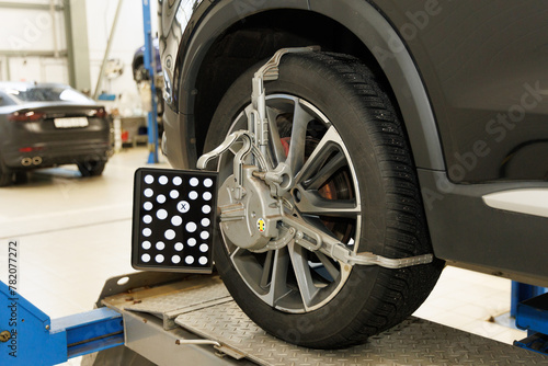 Target of the car wheel angle adjustment equipment fixed on a car wheel