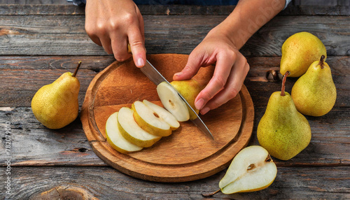 Close-up of two hands of a woman while cutting a pear into thin slices on a wooden cutting board view from above. On top of an old wooden table with some ripe pears. Generative Ai. photo
