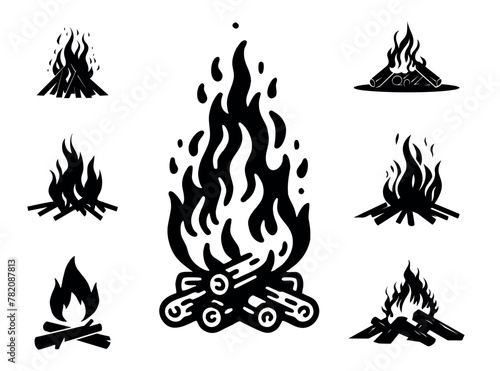 A set of silhouettes of bonfires in nature. Burning bonfires (ID: 782087813)