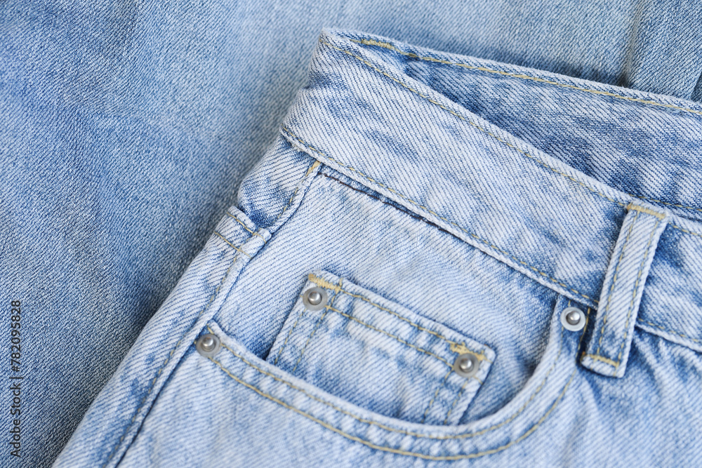 Fashionable denim jeans for teenagers, texture .background Fashionable denim jeans for teenagers, texture .background