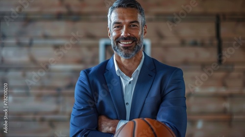 Outdoor basketball court, coach and happy man portrait training, collaboration and sports for college athlete team, professional player and fitness group. Proud, smile and teaching expert game skills photo