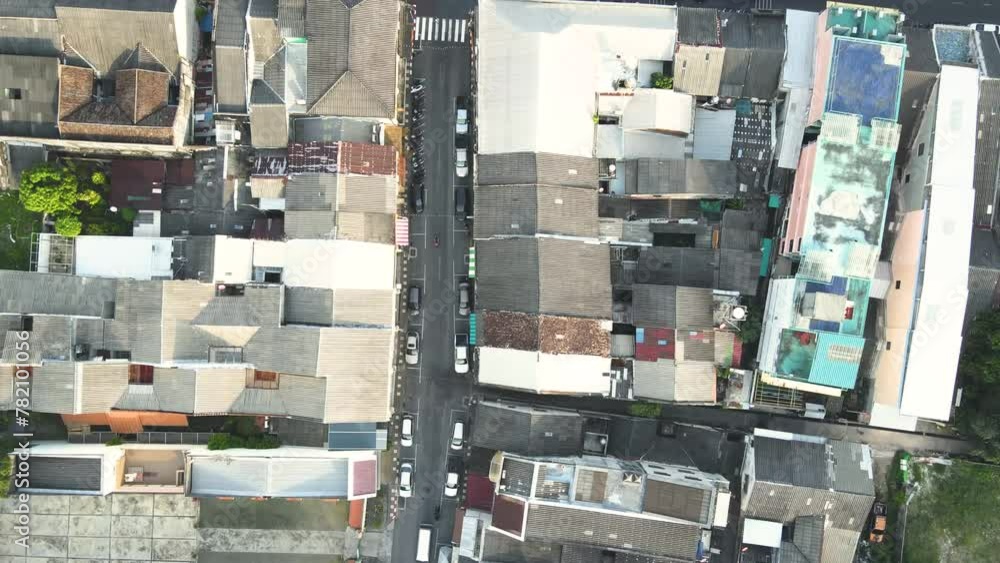 Aerial view, drone flying over Phuket city, Thailand. Drone over SinoPortugyese It's a Sunday in Phuket and tourists go shopping on the old streets filled with local merchants selling food and clothes Aerial view, drone flying over Phuket city, Thailand. Drone over SinoPortugyese It's a Sunday in Phuket and tourists go shopping on the old streets filled with local merchants selling food and clothes