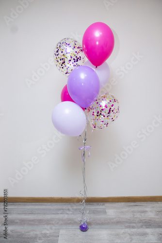 bouquet of purple balloons for woman